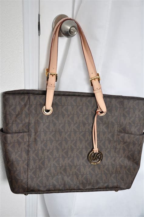 michael michael kors horizontal tote for macbook|michael kors go bag.